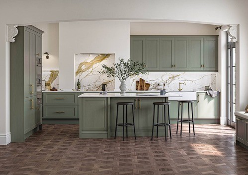 green shaker kitchen with quartz splashback