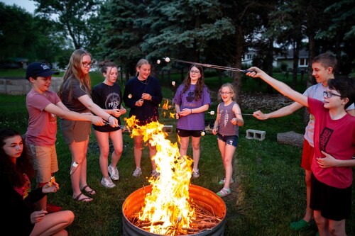 A group of teens serving together