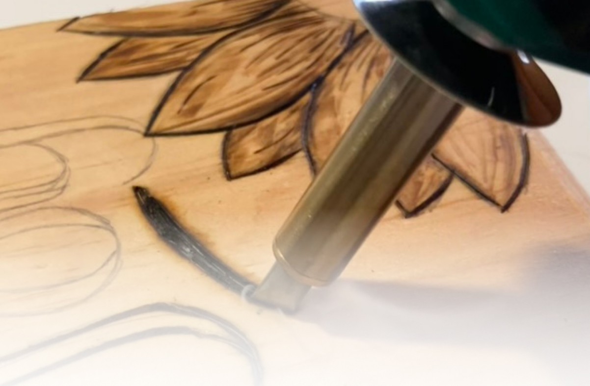 Wood burning art tools and finished sunflower design