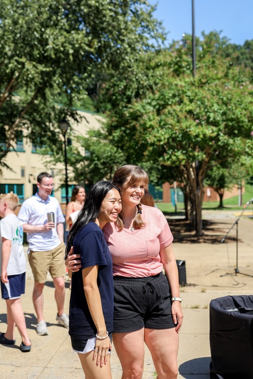 Restoration City Church welcome flags outside Gunston Middle School in Arlington, VA, inviting guests to Sunday service.