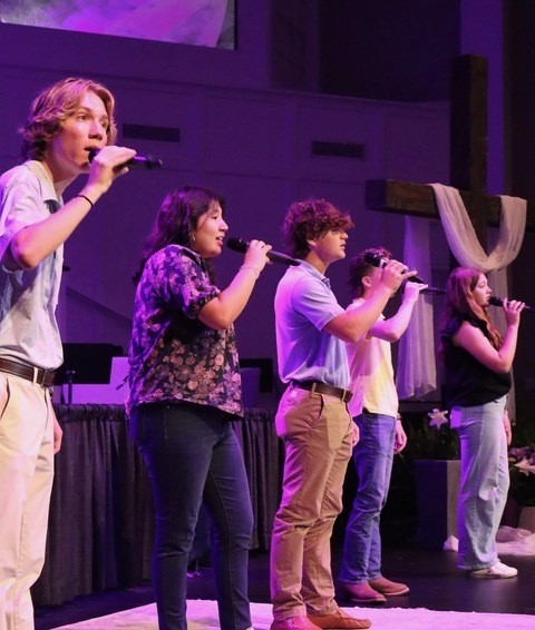 man listening to a woman talk