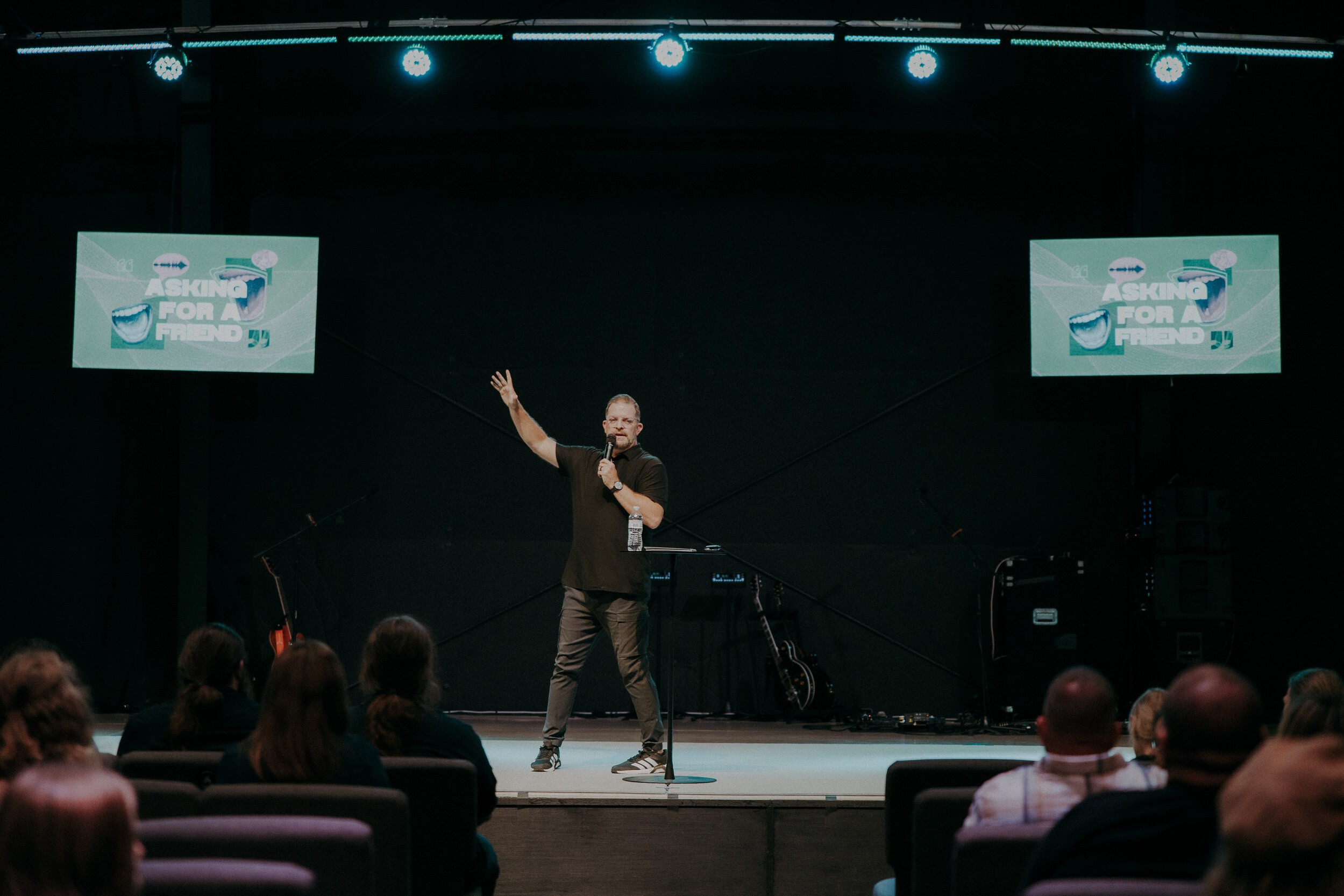 Pastor speaking during a Sunday service at Faith Family Church