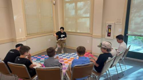 Leader teaching kids